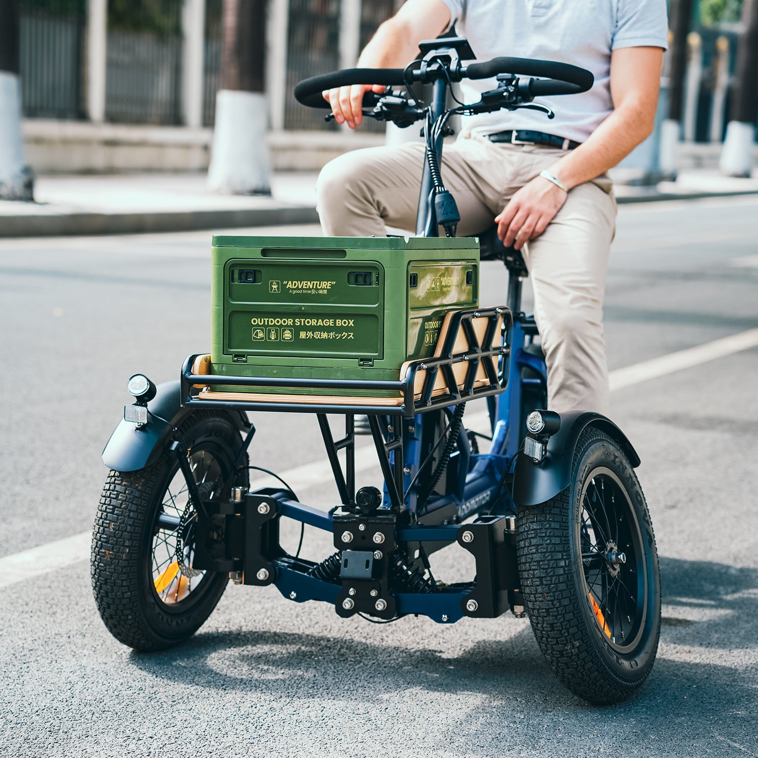 spytanx reverse trike with cargo in front on the road